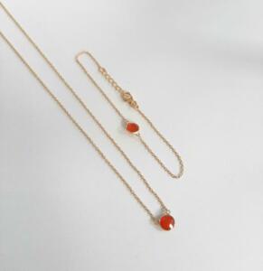 Vergulde set met red onyx